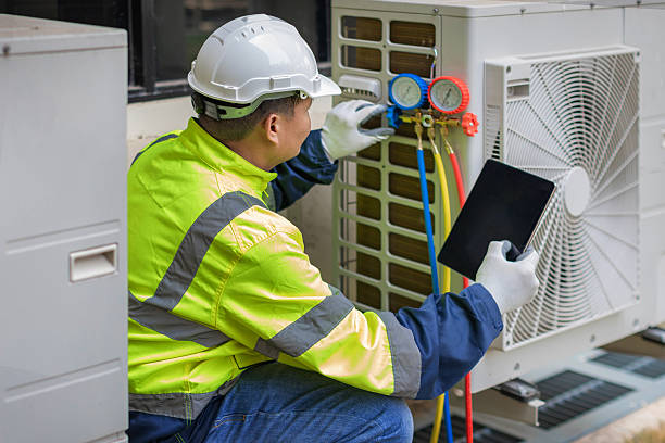 Professional Hvac technician working in Newbern, TN